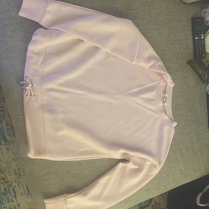 Light pink, crew neck, athletic material